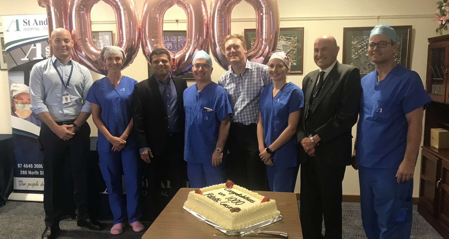 The Robotic Surgeons, Theatre Staff and Executive Team celebrate the robotic surgery milestone achievement.